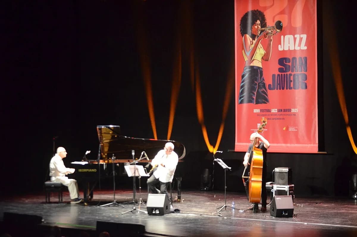 Three jazz musicians performing on stage at the San Javier Jazz Festival.