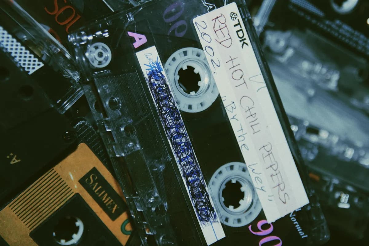 Close-up of retro cassette tapes with handwritten labels.
