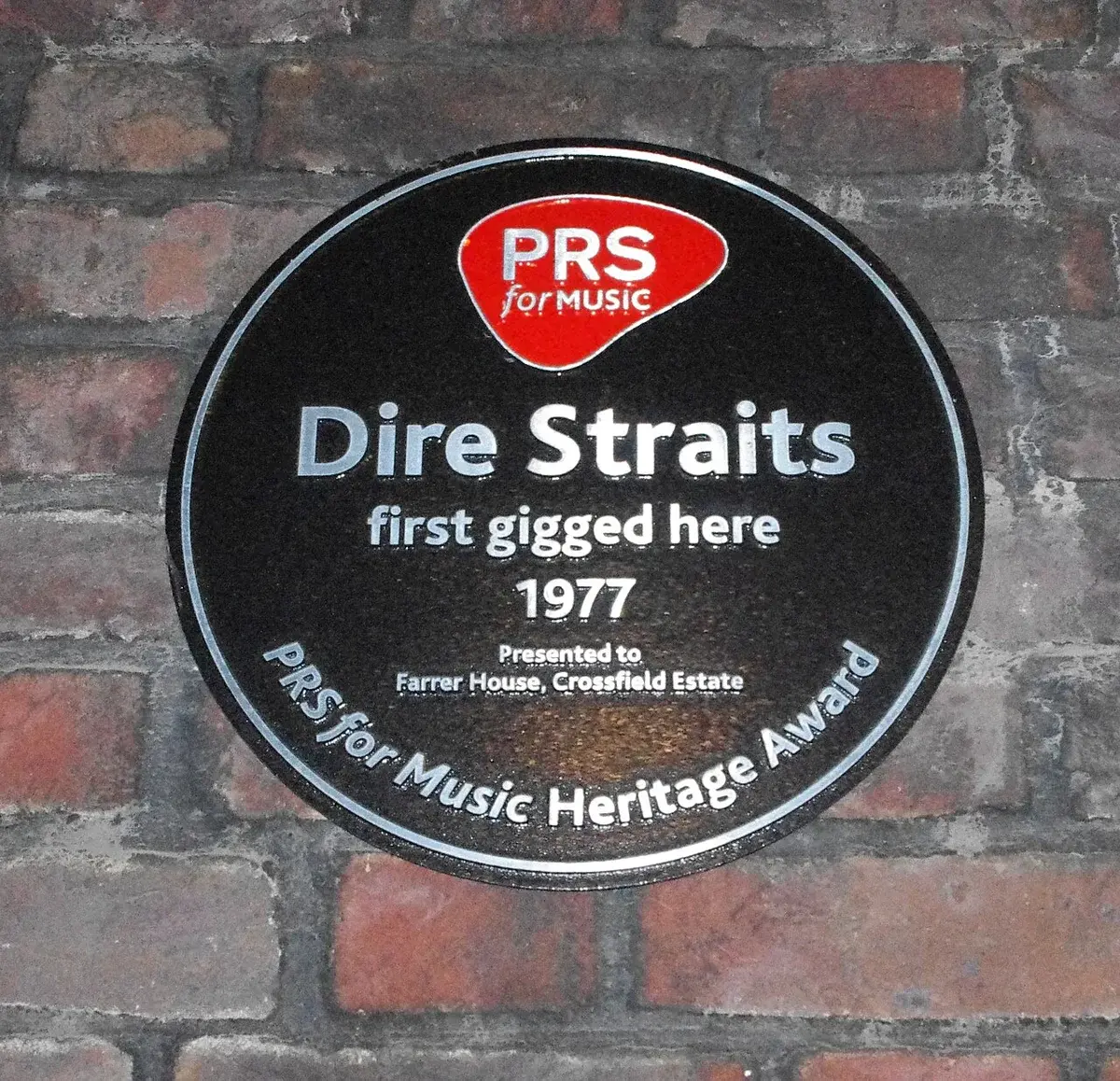 A PRS for Music plaque commemorating Dire Straits' first gig in 1977.
