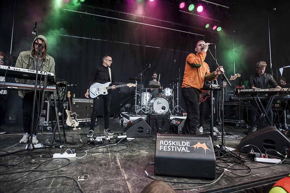 Band performing live at Roskilde Festival on stage
